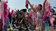 Revellers parade along Lakeshore Boulevard for annual Toronto Caribbean Carnival