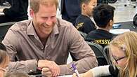 Prince Harry plays volleyball with Vancouver schoolchildren after appearance at Grey Cup