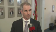Bill to keep Sidney MacEwen in cabinet shelved as commissioner calls it too broad