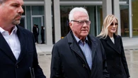 Frank Stronach pleads not guilty to 12 sexual assault charges, trial set for February