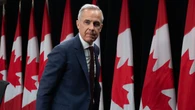 Canada 'at a disadvantage' in Iran but no plan to open embassy, Carney says