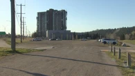 Calgary plans to pave pothole-ridden Edworthy Park lot, then charge for parking