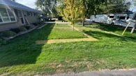Owner of home with Nazi symbol mowed into lawn is a nurse suspended for comments on immigrants, addicts