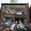 Severe storms sweep through Kentucky, killing at least 14 people, after tornado batters Missouri