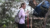 Texans rally to find survivors after deadly floods