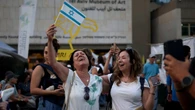 Israelis, Palestinians cheer ceasefire, but worry about lasting peace