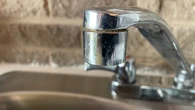 Hughes Brook plans to truck in water to fill critically low reservoir