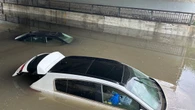 Heavy rain traps cars in Quebec City underpass, triggers power outages across province