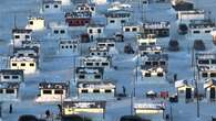 Quebec ice fishing aficionados celebrating colder winter