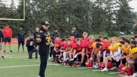 With help from the Hamilton Tiger-Cats, kids learn about how to stop gender-based violence
