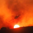 California wildfires threaten homes northwest of L.A.