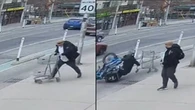 Video shows man push shopping cart into Toronto bike lane, sending rider crashing
