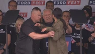 Protester gets on Ford Fest stage in Etobicoke at annual Ontario PC event