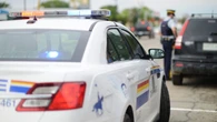 Man arrested after allegedly holding woman in her car 'against her will'