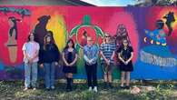 Community members in The Pas 'banded together even stronger' to restore defaced murals: organizer