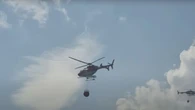 Wet, humid weather helps crews battle out-of-control wildfires, says fire duty officer