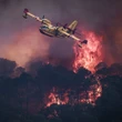 Raging wildfires in France and Spain force tens of thousands of people to flee