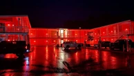 Essex County motel hopes new red lights keep keep fish flies at bay