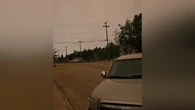 Residents forced out of Cranberry Portage after wildfires knock power, close highway, cripple air quality