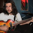 Musicians fight uphill battle as AI infiltrates streaming platforms, cutting into royalties