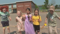 Students at Sherwood Elementary School gleefully leaping into summer early