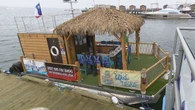 Floating tiki bar rescues 2 jet skiers in Halifax harbour