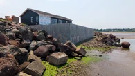 New concrete seawall a concern to neighbours but lies outside government jurisdiction