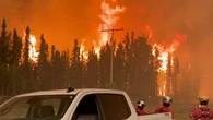 Wildfires threaten communities in Saskatchewan, Manitoba