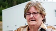 She lost her home, cats and prosthetic leg in the Western Bay fire. But she's determined to go back