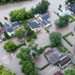 What caused the devastating flooding in parts of Manitoba?