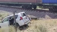 Внедорожник врезался в товарный поезд на юге Казахстана