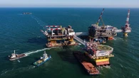 "КазМунайгаз" и "Лукойл" ищут варианты финансирования проектов на Каспии