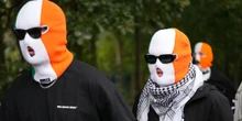 5 minuti faIn Inghilterra sono state archiviate le accuse di sostegno al terrorismo contro uno dei membri del gruppo rap nordirlandese Kneecap