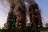 pochi secondi faDue aziende e sette persone sono state incriminate per il grave incendio nei grattacieli di Hong Kong dello scorso novembre