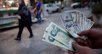 2 minuti faL’Iran vuole tagliare quattro zeri dalla sua monetaPer ridurre la quantità di banconote da portarsi dietro: ma il problema dell'inflazione non se ne andrà