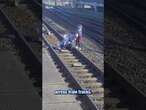 Woman drags stroller with kids across tracks