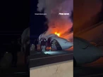 Desperate rescue efforts after business jet slams onto highway and catches fire #shorts #usa #us