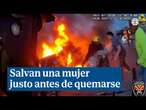 Un espectacular vídeo muestra como un policía americano salva a una mujer de un incendio en su coche