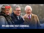 King joins Keir Starmer on visit to a housing project in Cornwall