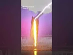 Lightning strikes fountain in Poland as children play nearby amid heat wave