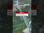 A testing team drove 96 trucks onto the Huajiang Grand Canyon Bridge in China. #China #BBCNews