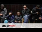 Israel delays Palestinian prisoner release as hostages freed | BBC News