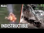 Russians FAIL to destroy Ukrainian armoured vehicle as it survives drone attacks & mine explosions