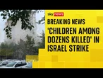 Iran state TV: Around 60 people killed in strike on housing complex, including 20 children