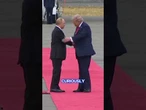 Sinister reason Putin walked with one arm by his side when meeting Trump
