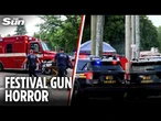 Manhunt launched after two gunmen open fire at festival leaving 12 injured
