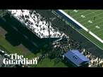 Aerial video shows evacuated students in football field after school shooting in Georgia