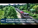 NIEDERLANDE: Heftige Dürre! Hausboote sitzen auf dem nackten Flussgrund