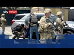 Riot police and National Guard set to enforce LA curfew as unrest continues