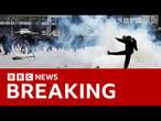 Mass protests in Greece on train tragedy anniversary | BBC News